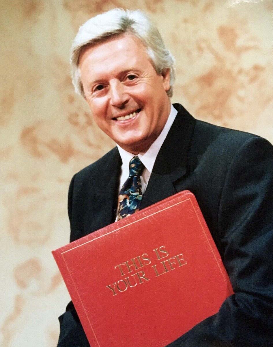 Michael Aspel with the Big Red Book